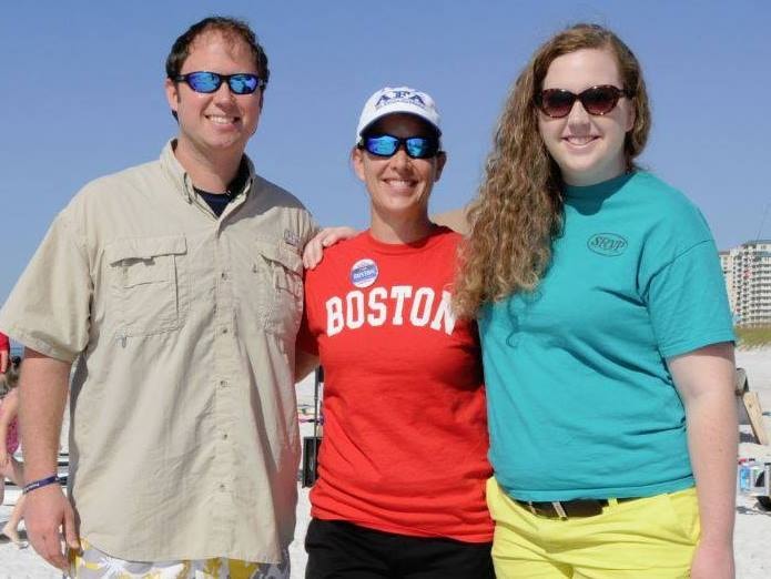 Carol Boston with supporters on the beach
