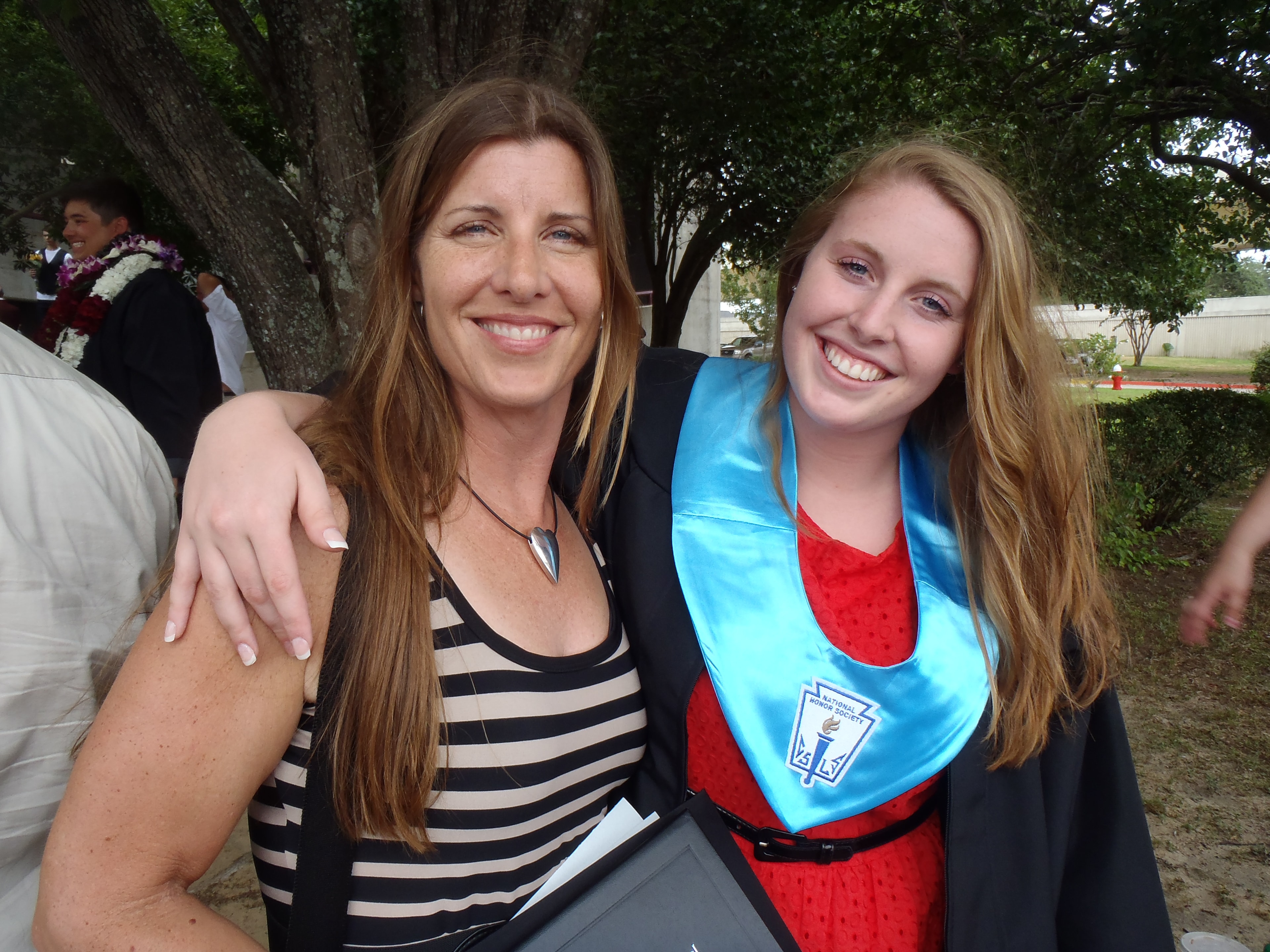 Carol Boston with her daughter at a graduation ceremony