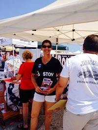 Carol Boston at an outdoor community event under a tent