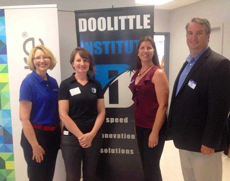 Carol Boston with colleagues at the Doolittle Institute event